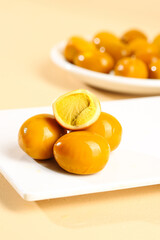 Braised Quail Eggs in Golden Sauce on White Dishes - Gourmet Country House Cuisine