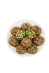Buckwheat Dumplings with Green Herb Filling on White Plate - Traditional Asian Food
