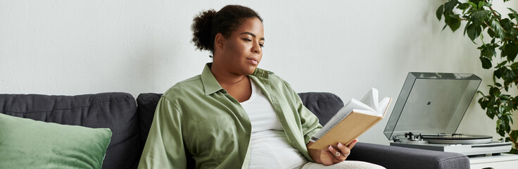 Relaxing afternoon with a book in a stylish modern apartment