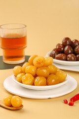 Colorful Pickled Peppers and Olives Mediterranean Appetizer Spread with Traditional Tea Glass