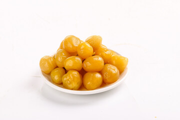 Pickled Yellow Peppers on White Plate - Colorful Preserved Vegetables Background