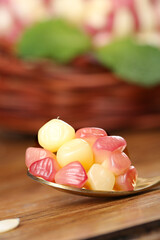 Assorted Fruity Gummy Candies on Wooden Spoon - Sweet Colorful Confectionery Treats
