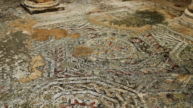 Preserved mosaics of Grand Nymphaeum in Roman settlement of Dougga with traditional geometric designs and motifs. Art of ancient civilizations. Historical archaeological sites in Tunisia. High quality