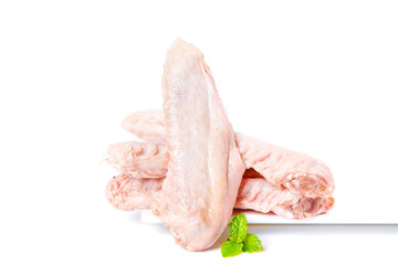Fresh Raw Duck Wings with Mint Garnish on White Background for Cooking and Food Preparation