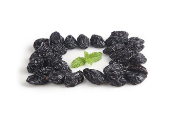 Large California Prunes Dried Fruits with Mint Leaf on White Background