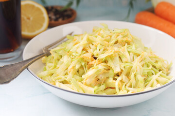 A bowl with coleslow salad