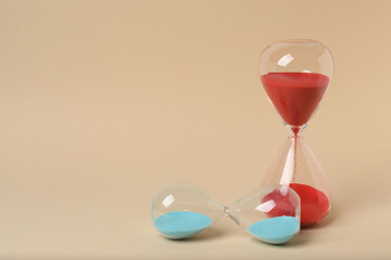 hourglass on a beige background
