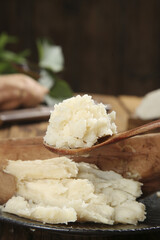 Creamy Mashed Potatoes on Wooden Spoon - Fresh Comfort Food Photography