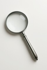 Magnifying Glass and Its Perspective: a close-up view, isolated on a neutral background, highlights the intricacies of the tool's design and its primary function, inviting contemplation of clarity.