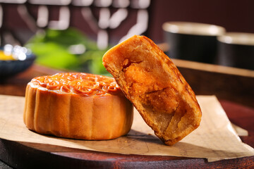 Traditional Cantonese Mooncakes with Lotus Seed Paste and Egg Yolk for Mid-Autumn Festival