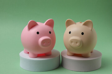 piggy bank, money dollars euros on a green background
