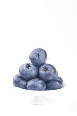 Fresh Yunnan Alpine Blueberries in White Bowl - Organic Berries on Clean Background