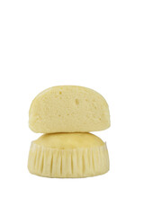 Artisan Steamed Cake Cut in Half Showing Light Fluffy Texture on White Background