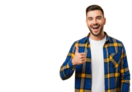 Young caucasian man in plaid shirt, smiling widely, giving thumbs-up, vibrant yellow studio background, copy space left, concept of approval and success