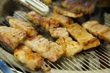 Korean Samgyeopsal (Pork Belly) Grilling on Hot Plate