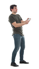 Excited guy stand all ears holding a joystick console looking attentive try to win, having fun in the virtual reality world. Addicted young man playing video games, full length portrait isolated