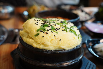 Korean Steamed Egg (Gyeranjjim) with Garnish in Restaurant