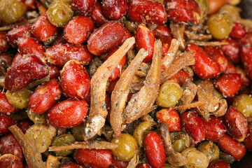 Mixed Nuts Dried Fruits Spiced Snack Mix with Peanuts and Colorful Ingredients Healthy Food Background