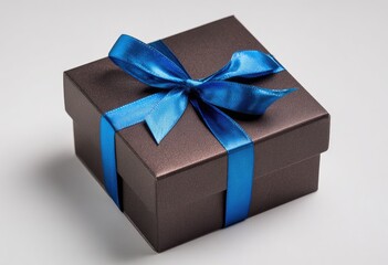 Obraz premium Dark brown gift box with blue ribbon