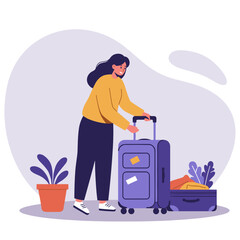 Woman packing suitcase with travel items next to indoor plant  