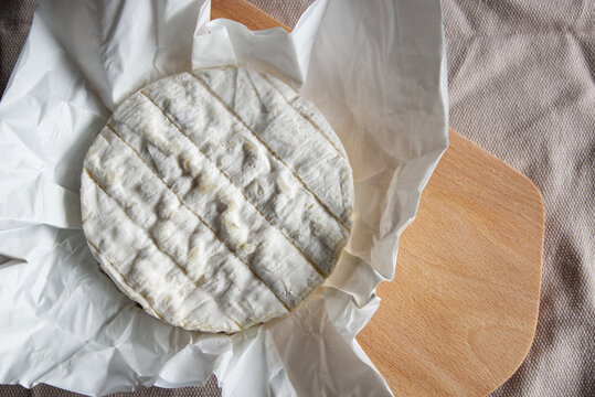 Camembert cheese, a soft and creamy cheese of French origin