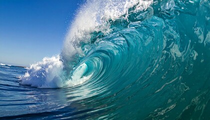 Water, ocean, sea, waves, foam, texture, blue, turquoise, liquid, surface, movement, ripple, flow, nature, marine, peaceful, refreshing, tropical, calm, horizon, sunlight, reflection, depth, clarity, 