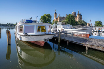 Fototapeta premium The Schwerin Castle and marina view in Schwerin Town of Germany