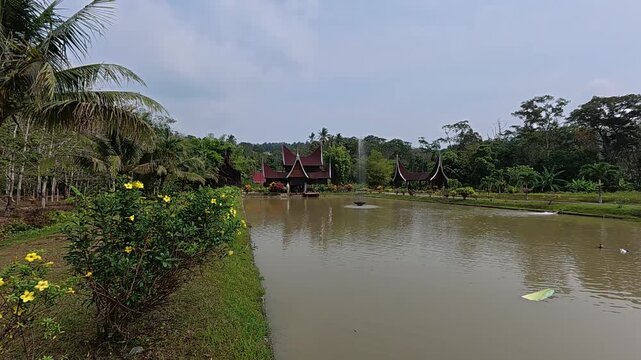Rumah Gadang Budi is a magnificent traditional Minangkabau house. It showcases the unique buffalo horn-shaped roof, a symbol of Negeri Sembilan's rich cultural heritage.