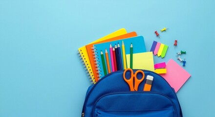 A vibrant assortment of essential school and office supplies spilling from a blue backpack, including colorful pencils, notebooks, and an eraser, arranged on a solid blue background