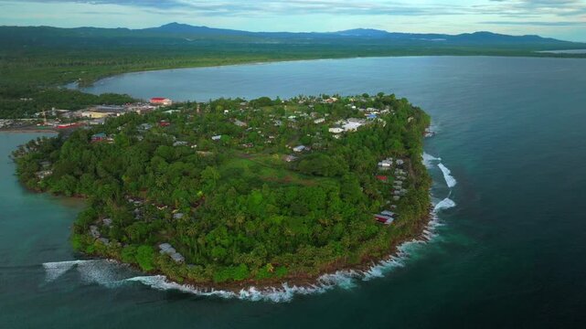 Wewak Hill Cape Wom peninsula morning summer dry season Wewak costal town aerial drone Papua New Guinea PNG panoramic ocean view Dogreto Bay Sundaun Market Boram Rd Inn Boutique Hotel forward pan up