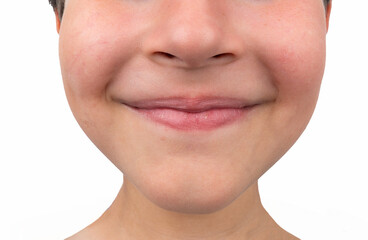 Obraz premium Cropped image of a child's mouth smiling.