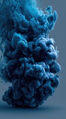 Deep blue ink swirling in a cloud-like form