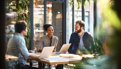 Young professionals collaborating on innovative startup ideas and strategies in a vibrant setting.