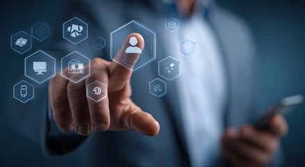 Businessman's hand points to a digital profile icon, surrounded by various data icons