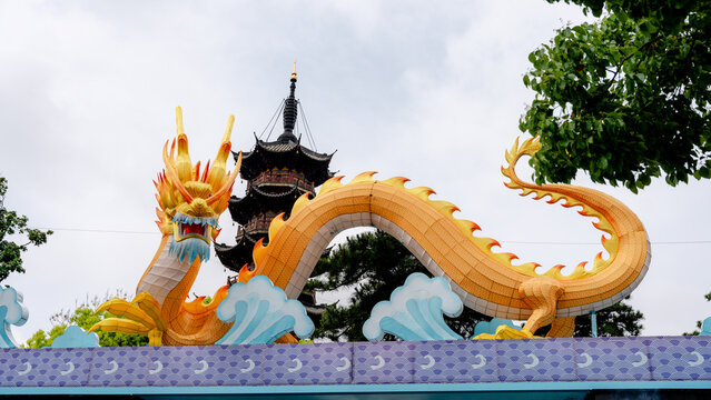 Colorful dragon sculpture at Longhua Temple entrance
