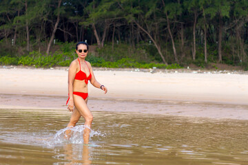 Fototapeta premium Woman in red bikini relax on beach