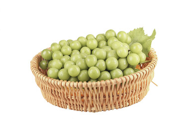 Fresh Green Grapes in Wicker Basket on White Background