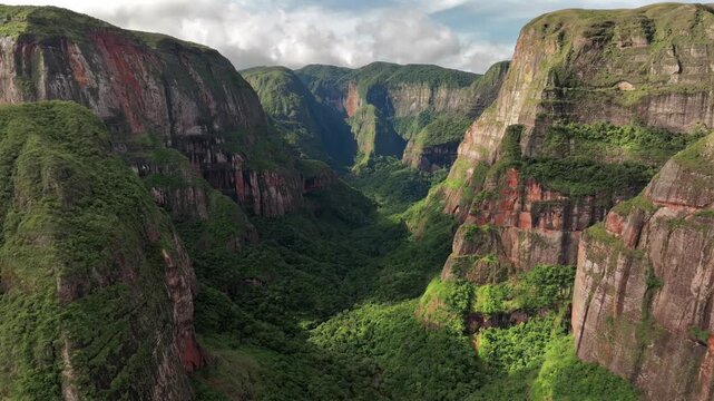Aerial view of the majestic Amboro National Park, with its towering cliffs and lush greenery creating a breathtaking contrast, Samaipata, Bolivia.