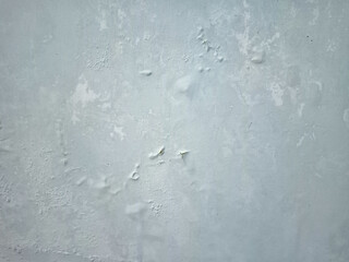Damp and moldy wall. Peeling of paint and swelling of the wall from excessive moisture. Water is leaking out of the wall.