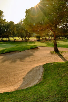 Beautiful golf course with sand bunker and green