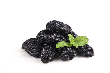 California Dried Prunes with Fresh Mint Leaves on White Background