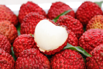Fresh Hainan Lychee Fruits with Peeled White Flesh - Tropical Asian Fruit Harvest Close-up