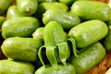 Fresh Mini Kiwi Berries with Water Droplets in Wooden Basket - Small Green Exotic Fruit