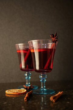 Mulled wine with spices in decorative glasses