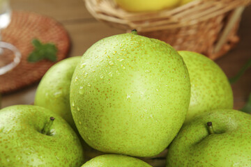 Fresh Green Pears with Water Droplets on Wooden Table - Organic Fruit Still Life