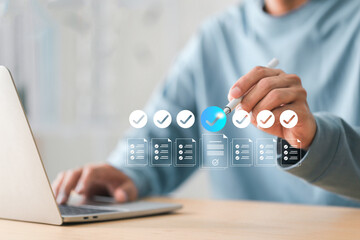Digital Data Verification and Management , businessman   working using smart technology of documents and check mark, symbolizing document validation, compliance, and approval workflow