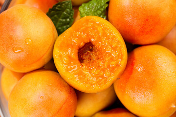 Fresh Ripe Xinjiang Apricots Cut in Half Showing Orange Flesh and Pit Stone Fruit Healthy Organic Food