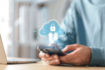 Cloud based file storage with advanced security , Man working with mobile phone showing cloud computing diagram .