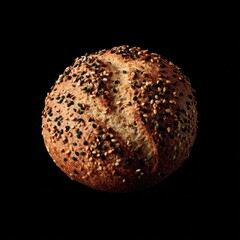 Freshly baked sesame seed roll on a dark background highlighting its texture and warm color