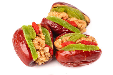 Stuffed Dates with Walnuts and Dried Fruit - Healthy Gourmet Snack on White Background